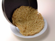 Image of sliding noodles onto a plate.